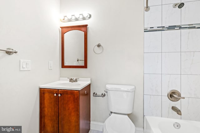 full bathroom featuring vanity, toilet, and tiled shower / bath combo