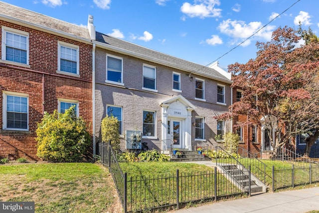 view of property with a front yard