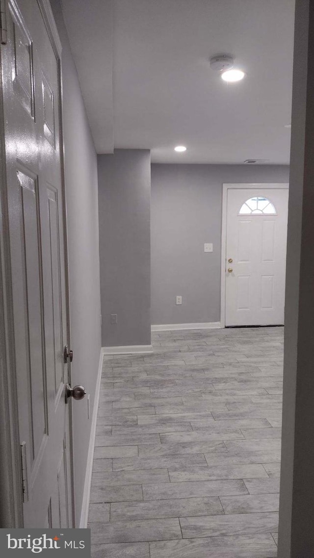 entryway with light wood-type flooring