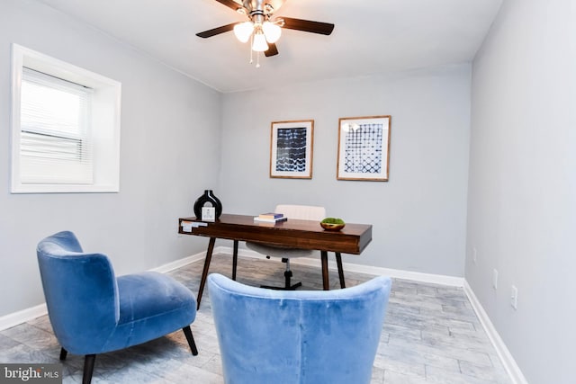 office featuring wood-type flooring and ceiling fan