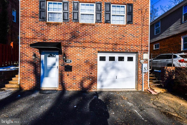 exterior space with a garage