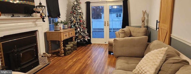 living room with french doors and dark hardwood / wood-style floors