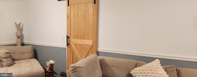 living area with a barn door