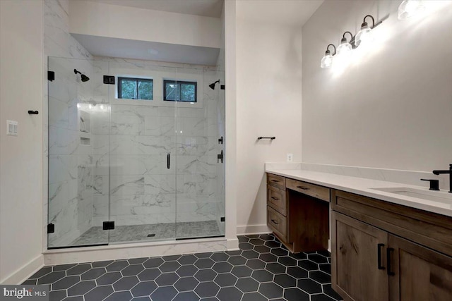 bathroom with vanity, tile patterned floors, and walk in shower