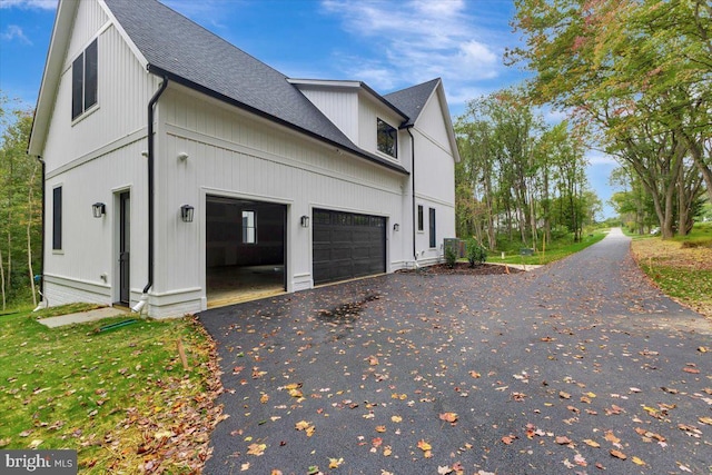 view of property exterior with a garage