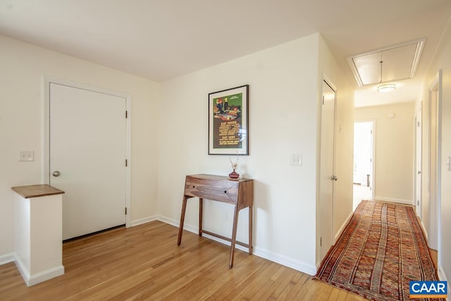 hallway with light wood-type flooring