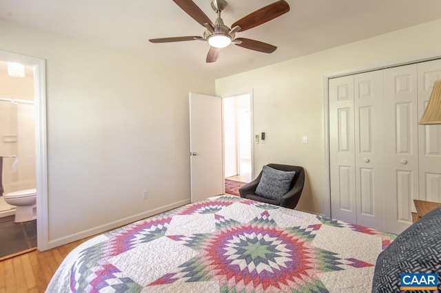 bedroom featuring ceiling fan, a closet, light hardwood / wood-style floors, and ensuite bathroom