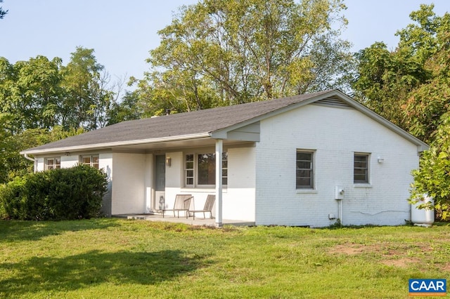 exterior space with a yard