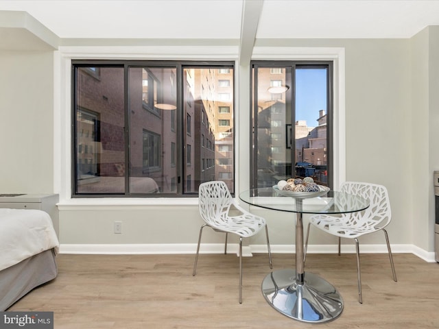 interior space featuring breakfast area and light hardwood / wood-style flooring