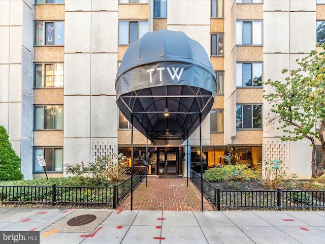 property entrance with fence