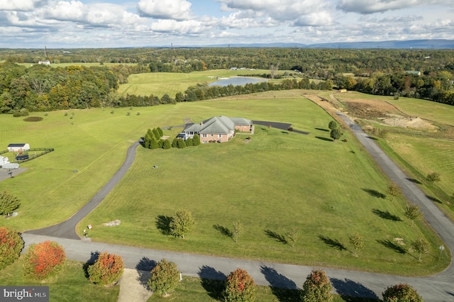 birds eye view of property featuring a rural view