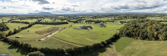 birds eye view of property with a rural view and a mountain view