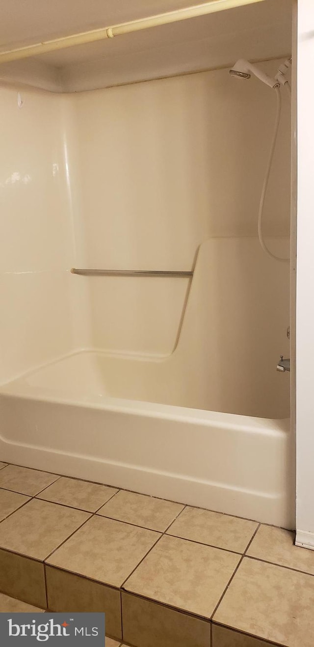 bathroom featuring tile patterned floors and shower / tub combination