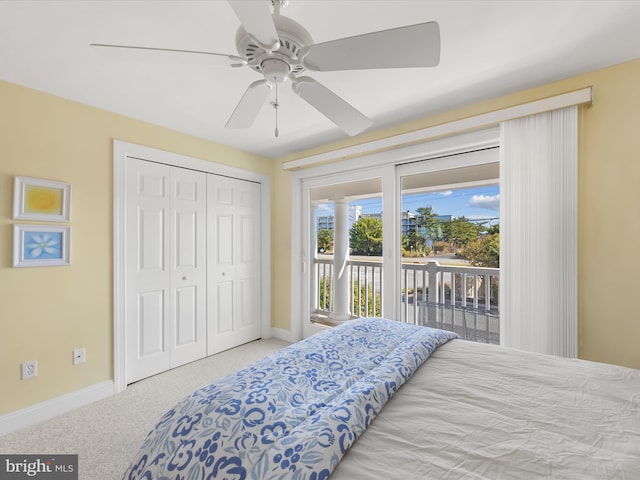 bedroom with a closet, ceiling fan, access to outside, and carpet