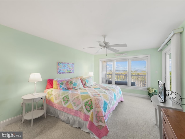 bedroom with light carpet and ceiling fan