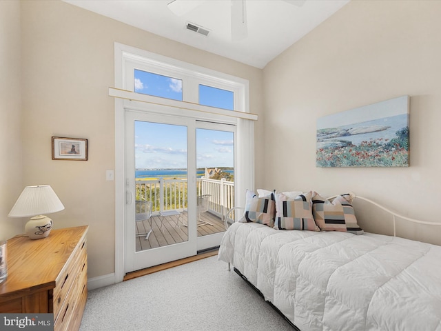 carpeted bedroom featuring lofted ceiling, access to outside, and ceiling fan