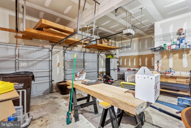 garage featuring a garage door opener and white fridge