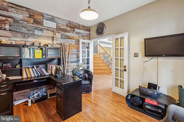 home office with french doors and wood-type flooring