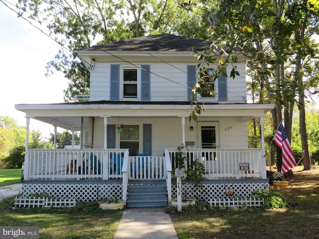 farmhouse-style home with covered porch