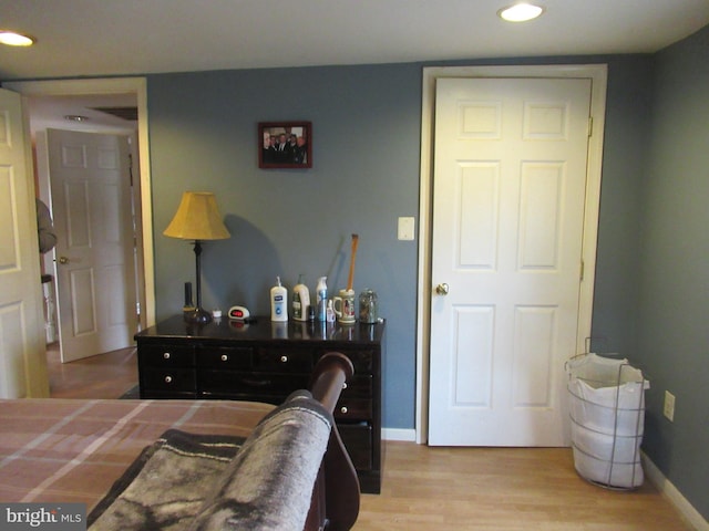 bedroom featuring wood-type flooring