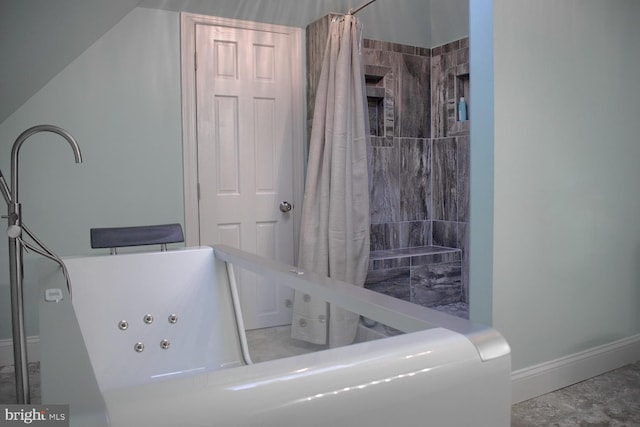 bathroom with separate shower and tub