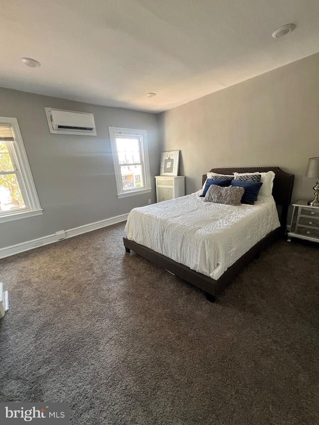 carpeted bedroom featuring a wall mounted air conditioner