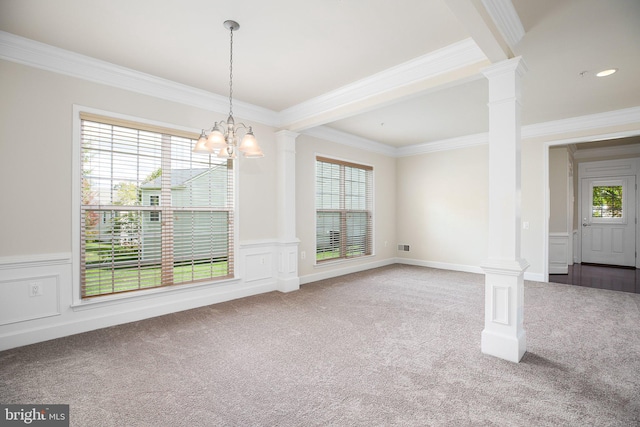 unfurnished dining area with a wealth of natural light, carpet flooring, and crown molding