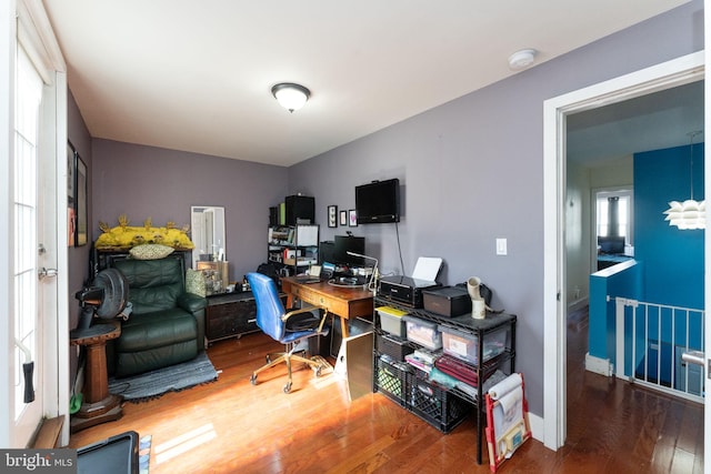 office with hardwood / wood-style floors