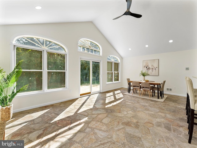 living room with high vaulted ceiling, ceiling fan, and a healthy amount of sunlight