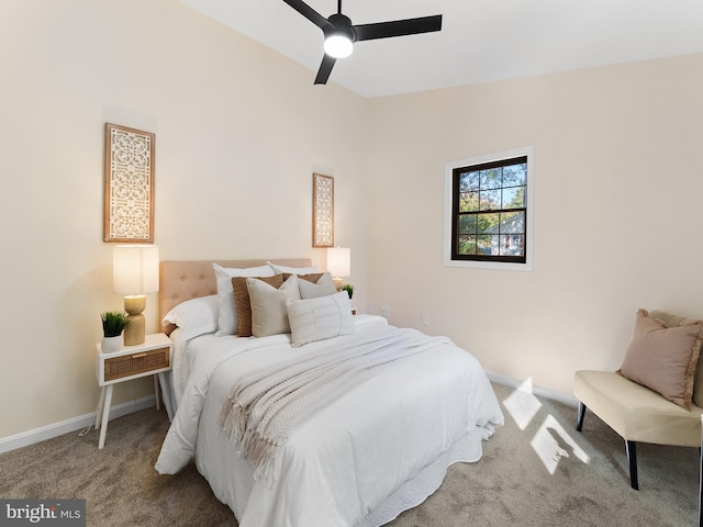 bedroom with carpet flooring, ceiling fan, and vaulted ceiling