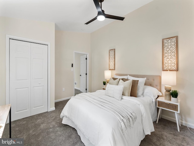 bedroom with dark colored carpet, a closet, and ceiling fan