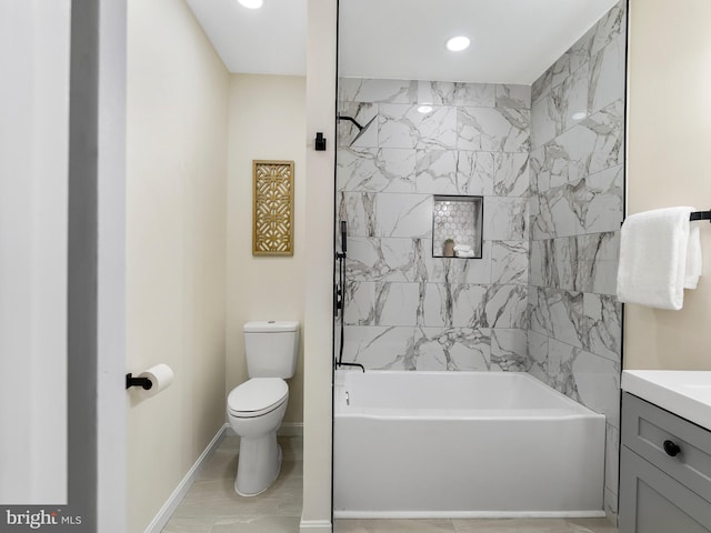 full bathroom featuring vanity, toilet, and tiled shower / bath combo