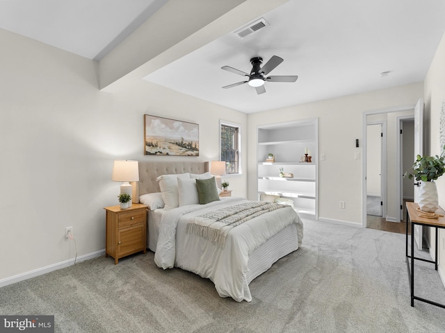 carpeted bedroom featuring ceiling fan