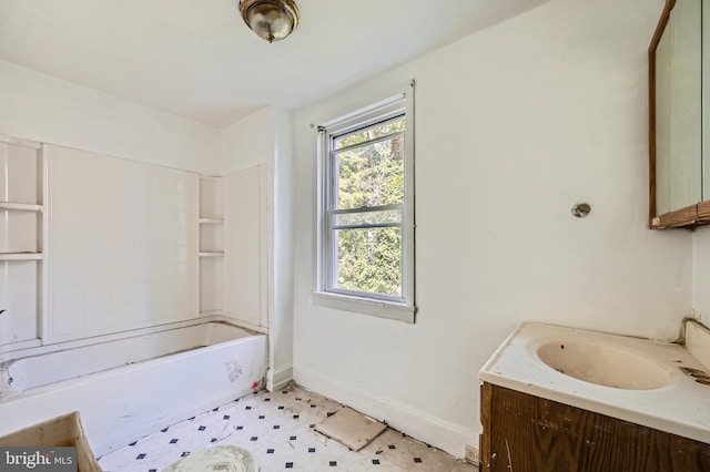 bathroom featuring vanity and tub / shower combination