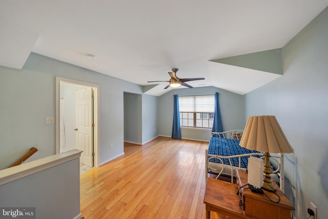 sitting room featuring lofted ceiling, light wood-type flooring, and ceiling fan