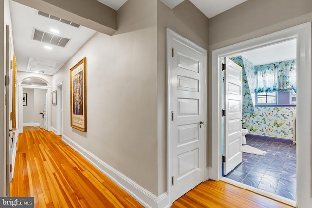 hallway featuring hardwood / wood-style floors