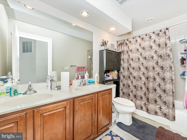 full bathroom featuring tile patterned flooring, vanity, shower / tub combo with curtain, and toilet