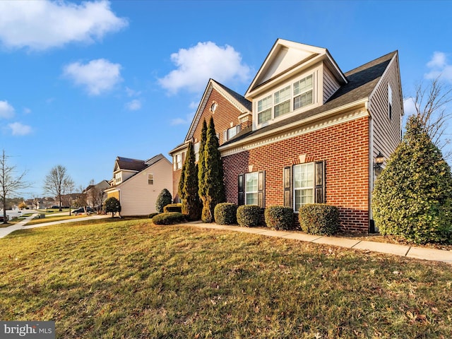 view of front facade featuring a front yard