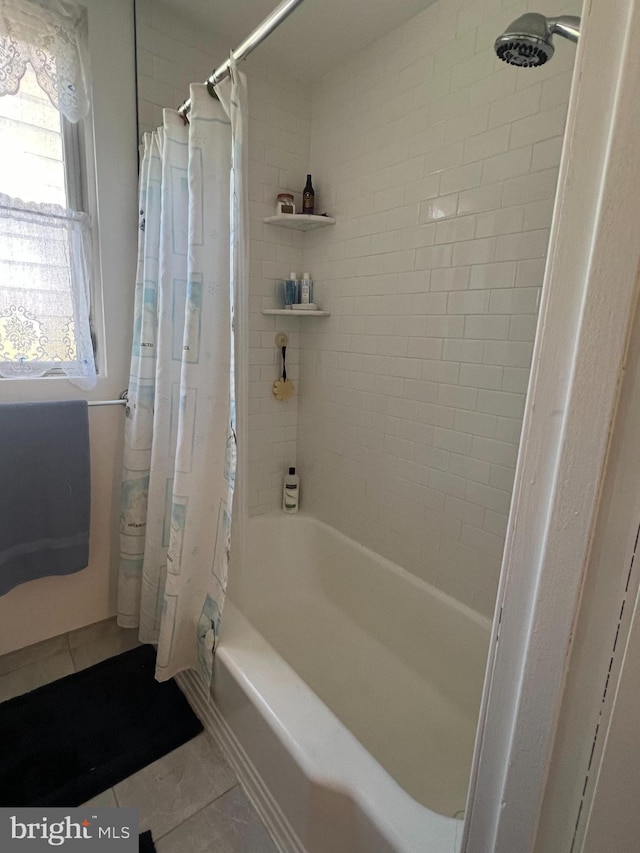 bathroom featuring shower / bathtub combination with curtain