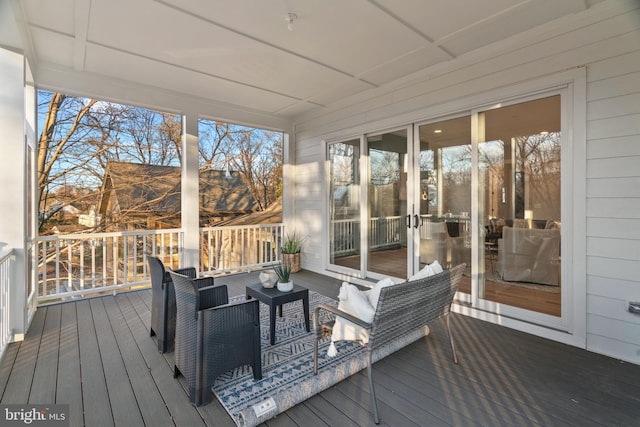 sunroom / solarium featuring plenty of natural light