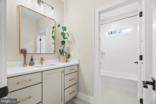 bathroom with tile patterned floors, shower / bathing tub combination, and vanity