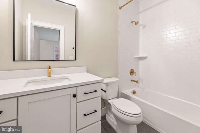 full bathroom with tiled shower / bath combo, toilet, and vanity