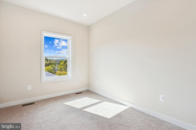 view of carpeted spare room