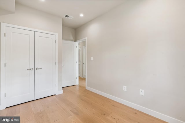 unfurnished bedroom featuring light hardwood / wood-style flooring