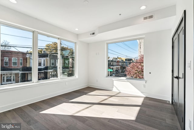 interior space with dark wood-type flooring