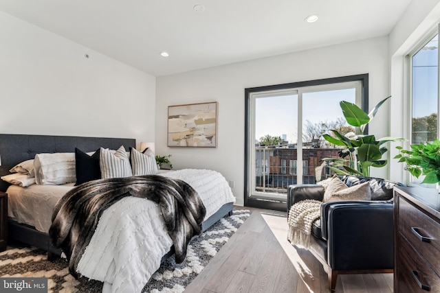 bedroom with light hardwood / wood-style floors