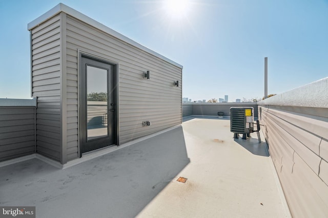 view of side of home featuring central air condition unit