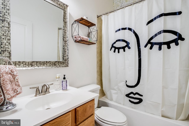 bathroom featuring toilet, vanity, and shower / bathtub combination with curtain