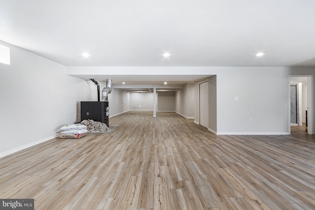 unfurnished living room with light wood-type flooring