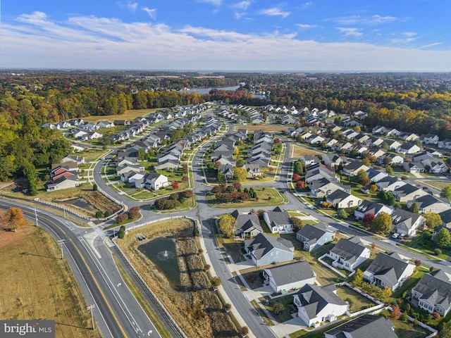 birds eye view of property with a residential view